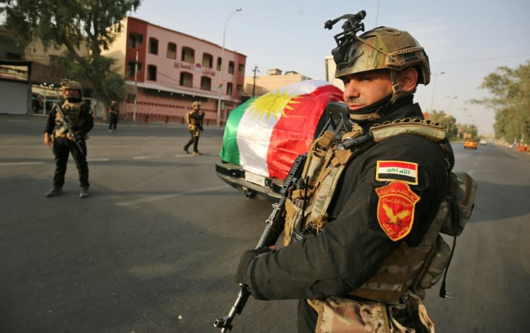 Members of SWAT affiliated to the Iraqi interior ministry deploy on the streets after a curfew was imposed on the disputed northern city of Kirkuk, during the vote on the Kurdish independence on September 25, 2017