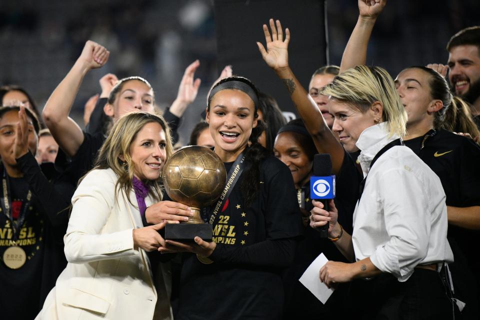 Portland Thorns FC forward Sophia Smith (9) receives the MVP trophy after the NWSL championship soccer match against the Kansas City Current, Saturday, Oct. 29, 2022, in Washington. Portland won 2-0. She is among the handful of new stars heading to the 2023 World Cup with the USWNT.