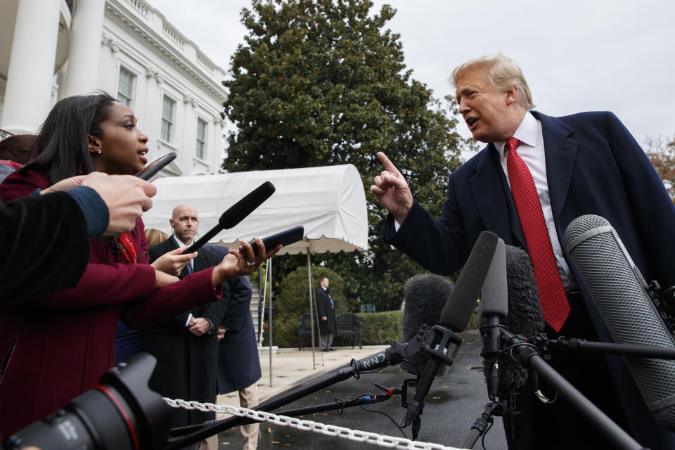 CNN journalist Abby Phillip asks President Trump a question outside the White House as he speaks with reporters before departing for France on Nov. 9, 2018. (Photo: Evan Vucci/AP)