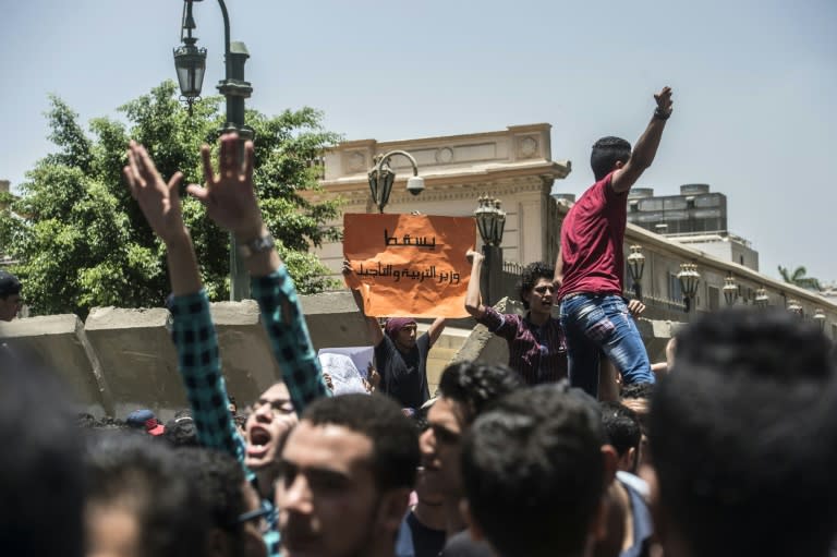 Egyptian students demonstrate outside the education ministry after cheat sheets for high school exams were leaked putting the spotlight on flaws in the education system