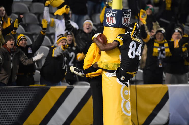 Antonio Brown puts on a show during and after the play. (Getty)