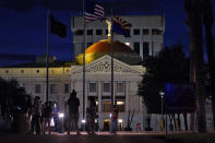 FILE - Protesters gather outside the Capitol to voice their dissent with an abortion ruling, Friday, Sept. 23, 2022, in Phoenix. An Arizona judge ruled the state can enforce a near-total ban on abortions that has been blocked for nearly 50 years. The law was first enacted decades before Arizona became a state in 1912. (AP Photo/Matt York, File)