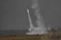 Israel's Iron Dome anti-missile system fires to intercept a rocket launched from the Gaza Strip towards Israel, near the Israeli Gaza border, Israel, Saturday, Aug. 6, 2022. (AP Photo/Ariel Schalit)