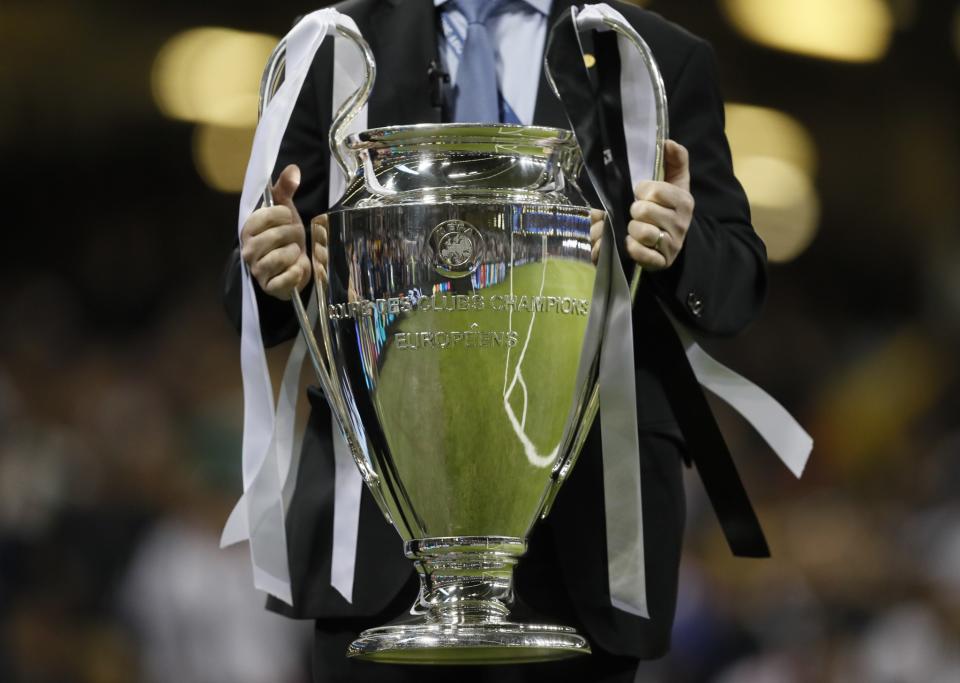 <p>The trophy is put on display before the Champions League final soccer match between Juventus and Real Madrid at the Millennium stadium in Cardiff, Wales </p>