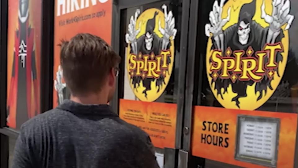 Nick Lutsko walking into a Spirit Halloween store