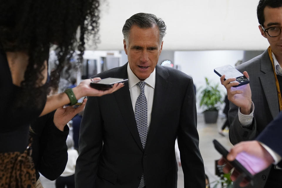 FILE - Sen. Mitt Romney, R-Utah, speaks with members of the press Nov. 16, 2022, on Capitol Hill in Washington. The Senate is set to vote Nov. 29 on legislation to protect same-sex and interracial marriages, putting Congress one step closer to ensuring that such unions are enshrined in federal law. (AP Photo/Patrick Semansky, File)