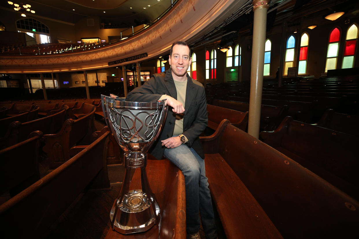 NASHVILLE, TENNESSEE - DECEMBER 04: Monster Energy NASCAR Cup Series Champion Kyle Busch poses for a photo with the Championship Trophy at the Ryman Auditorium on December 04, 2019 in Nashville, Tennessee. (Photo by Chris Graythen/Getty Images)