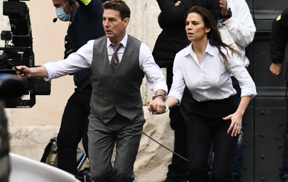 <p>Tom Cruise and Hayley Atwell are seen handcuffed while filming <em>Mission: Impossible 7</em> in Rome on Tuesday.</p>