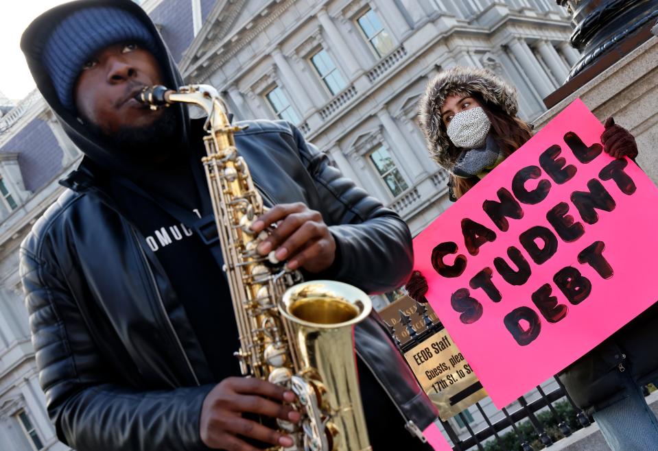 Student loan borrowers demand President Joe Biden cancel student debt during a demonstration outside the White House on Feb. 16.