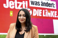 Ezgi Guyildar, the 35-year-old daughter of Kurdish refugees from Turkey, candidate of the German Left Party (Die Linke) for the upcoming parliament elections, smiles during an interview with the Associated Press in Berlin, Germany, Sunday, Sept. 19, 2021. Hundreds of immigrants are running in Germany's national election on Sunday, raising the possibility of making its next parliament more diverse than ever. While it still might not fully represent the country's overall diversity, where more than a quarter of the population has immigrant roots, it's a step toward a more accurate reflection of society. (AP Photo/Michael Sohn)