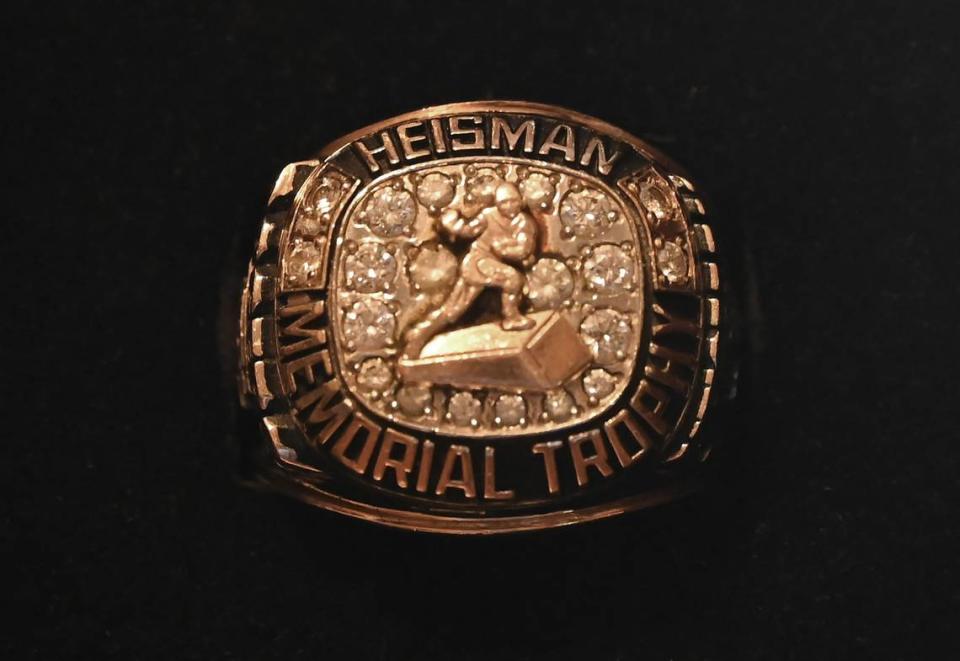 Former South Carolina Gamecocks running back and Heisman Trophy winner George Rogers Heisman Memorial Trophy ring is among Rogers’ mementos on Tuesday, May 23, 2023. Rogers won the Heisman in 1980.