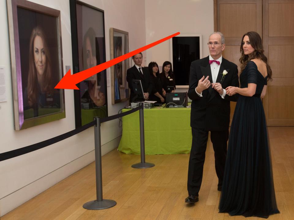 Kate Middleton looks at her portrait at the National Portrait Gallery.