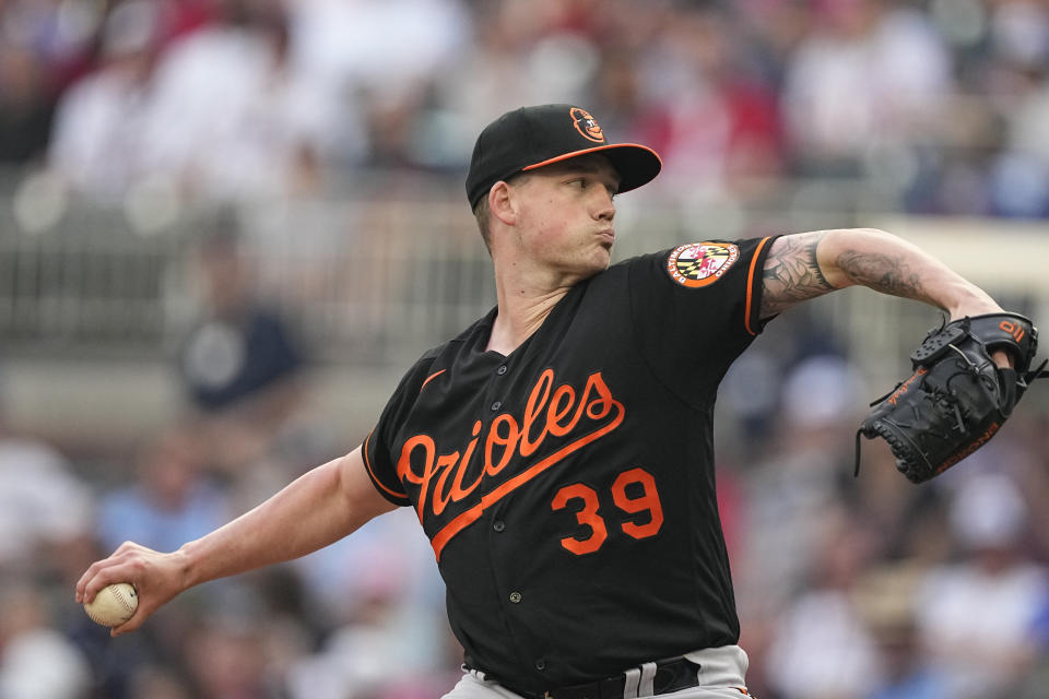 Baltimore Orioles starting pitcher Kyle Bradish works in the first inning of a baseball game against the Atlanta Braves, Saturday, May 6, 2023, in Atlanta. (AP Photo/John Bazemore)