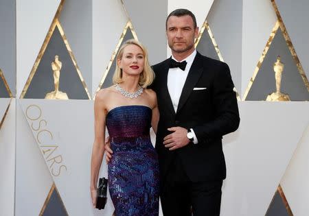 Actors Naomi Watts and husband Liev Schreiber arrive at the 88th Academy Awards in Hollywood, California February 28, 2016. REUTERS/Lucy Nicholson/File Photo