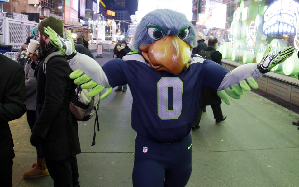 Blitz, the Seattle Seahawks mascot, walks through Times Square, Friday, Jan. 31, 2014 in New York. The Seattle Seahawks will play the Broncos Sunday in the NFL Super Bowl XLVIII football game in East Rutherford, N.J. (AP Photo/Ted S. Warren)