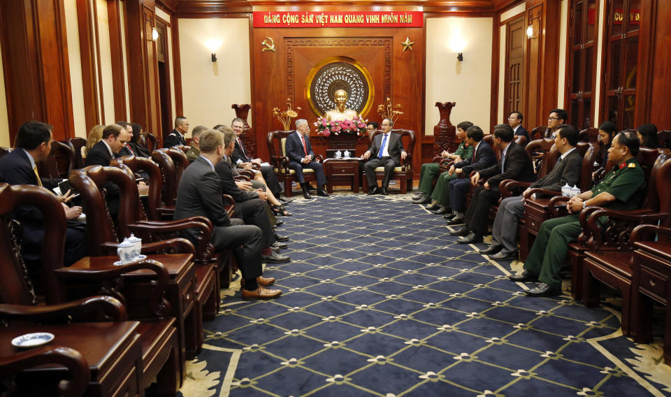 U.S. Defense Secretary Jim Mattis, center left, meets Ho Chi Minh City's communist party chief Nguyen Thien Nhan, center right, in Ho Chi Minh City, Vietnam Tuesday, Oct. 16, 2018. (Kham/Pool Photo via AP)