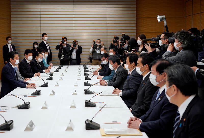 Japan's Prime Minister Shinzo Abe speaks during a meeting about the measures against the coronavirus disease (COVID-19), at the prime minister official residence in Tokyo