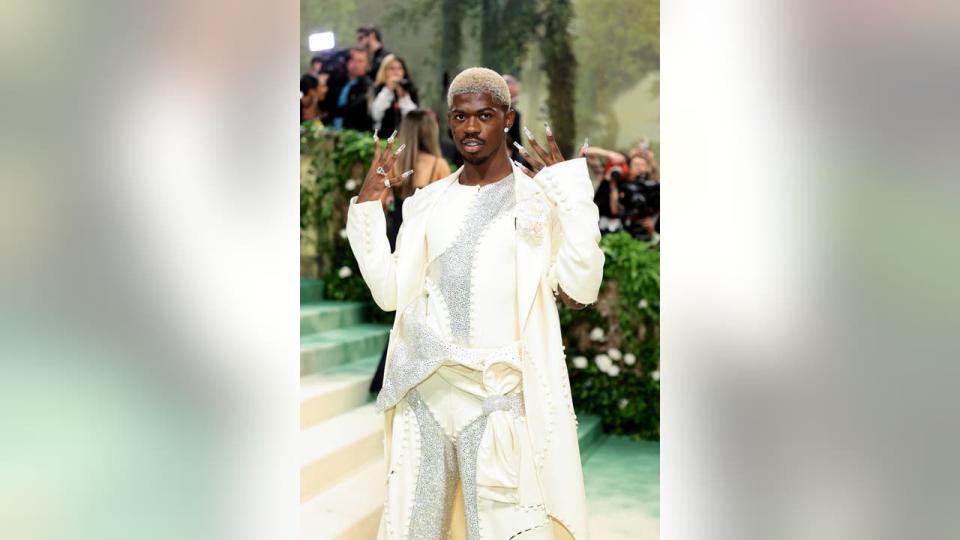<div>NEW YORK, NEW YORK - MAY 06: Lil Nas X attends The 2024 Met Gala Celebrating "Sleeping Beauties: Reawakening Fashion" at The Metropolitan Museum of Art on May 06, 2024 in New York City. (Photo by Dimitrios Kambouris/Getty Images for The Met Museum/Vogue)</div>