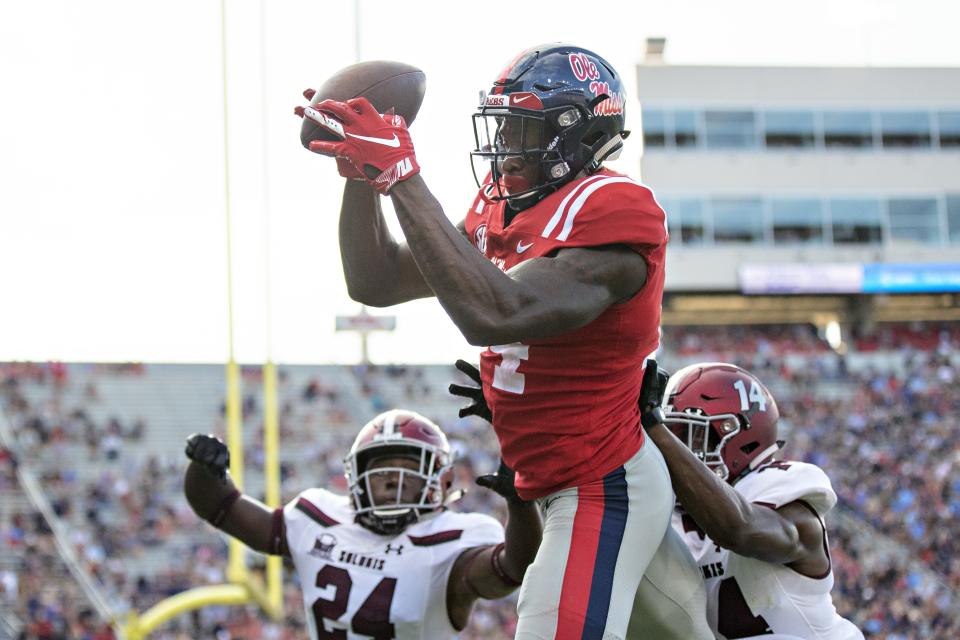 OXFORD, MS - SEPTEMBER 8:  D.K. Metcalf #14 of the Mississippi Rebels catches a pass during a game against the Southern Illinois Salukis at Vaught-Hemingway Stadium on September 8, 2018 in Oxford, Mississippi.  The Rebels defeated the Salukis 76-41.  (Photo by Wesley Hitt/Getty Images)