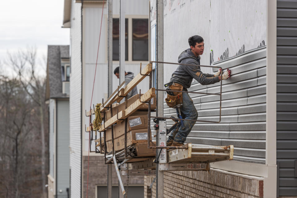 Construction workers in Laurel, Maryland, on Feb. 6, 2020. Buildings use roughly 40% of all energy produced in the U.S. for heating, power and cooking appliances, and generate a proportional share of the country&rsquo;s planet-heating gases.  (Photo: Craig Hudson for The Washington Post via Getty Images)