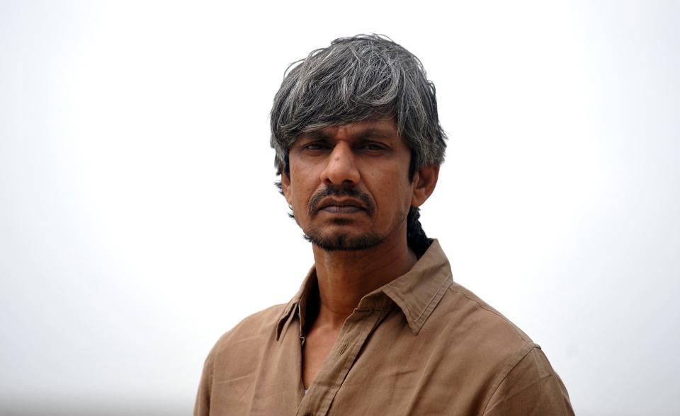 Indian Bollywood actor Vijay Raaz takes part in a promotional event for upcoming Hindi comedy film Bankey Ki Crazy Baarat in Mumbai on July 20, 2015. AFP PHOTO        (Photo credit should read STR/AFP via Getty Images)