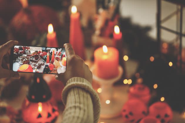 The colors of fall decor — oranges and yellows — are often associated with happy emotions. (Photo: fotostorm via Getty Images)