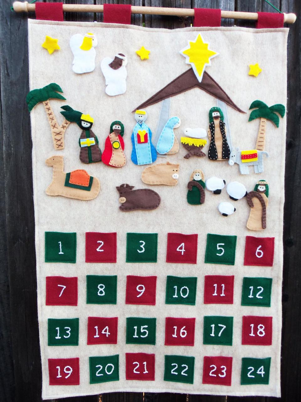 This undated publicity photo provided by Jessica Anderson shows a carefully cut out and sewed nativity scene that tells the story of Jesus’ birth which Anderson, of Rancho Cordova, Calif., made to teach her three young children. She’s convinced advent calendars promote family bonding. “I feel with the advent calendar, it’s something they will remember when they grow up,” says Anderson, who blogs at Cutesy Crafts. (AP Photo/Jessica Anderson, Jessica Anderson)