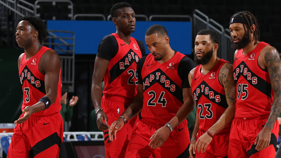 MILWAUKEE, WI - FEBRUARY 18: The Toronto Raptors walk off the court during the game against the Milwaukee Bucks on February 18, 2021 at the Fiserv Forum Center in Milwaukee, Wisconsin. NOTE TO USER: User expressly acknowledges and agrees that, by downloading and or using this Photograph, user is consenting to the terms and conditions of the Getty Images License Agreement. Mandatory Copyright Notice: Copyright 2021 NBAE (Photo by Gary Dineen/NBAE via Getty Images)