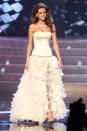 <b>Miss Universe 2012 </b><br><br>Miss Hungary Agnes Konkoly wore a white ruffled gown for the evening wear part of the pageant. <br><br>© Getty