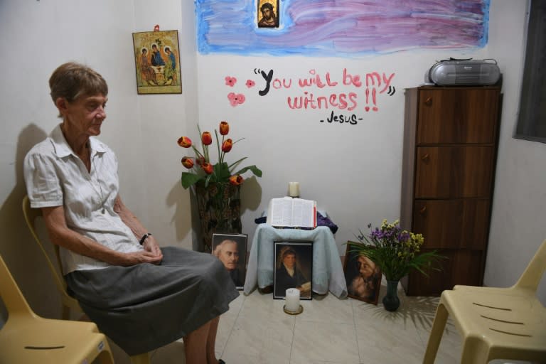 Australian nun Patricia Fox, who faces deportation, prays in a mini-chapel at her residence in Manila