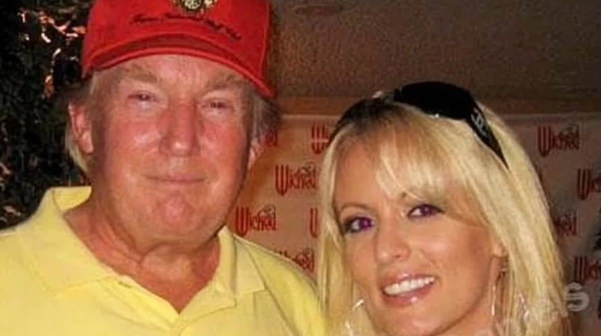Donald Trump pictured with Stormy Daniels at the 2006 golf tournament (Sourced)