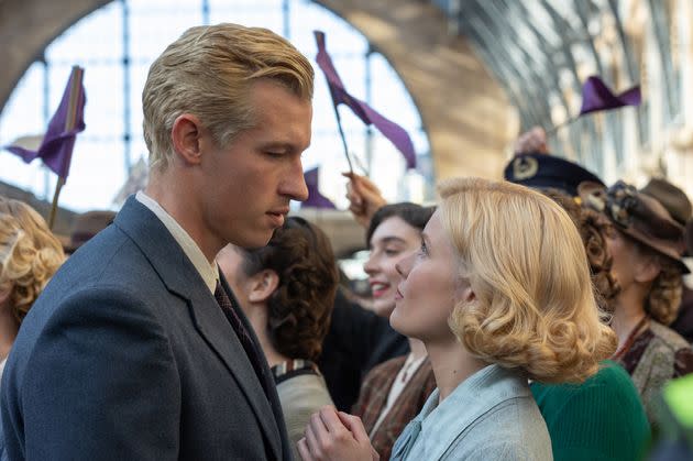 Actors Callum Turner (left) and Hadley Robinson (right) look into each other's eyes during an emotional scene in George Clooney-directed film 