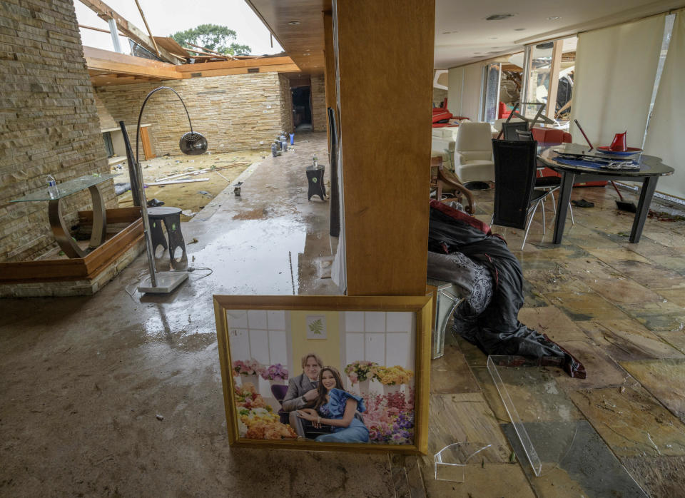 This photo shows the damaged home of Eric and Indra Ehlenberger in New Orleans on Wednesday, July 10, 2019, following a storm that swamped the city and paralyzed traffic. (Photo: Matthew Hinton/AP)