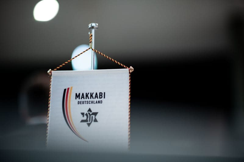 A pennant with the logo of the Maccabi movement stands on a table in the German Football Museum. Jewish sports organization Maccabi Germany has called on the ruling football body FIFA to dismiss a Palestine association (PFA) motion seeking sactions against Israel at its congress later this week. Fabian Strauch/dpa