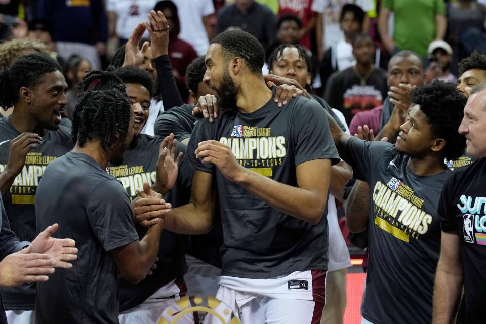 Cleveland Cavaliers forward Isaiah Mobley, center, celebrates with teammates after defeating the Houston Rockets in the NBA summer league championship game July 17 in Las Vegas.
