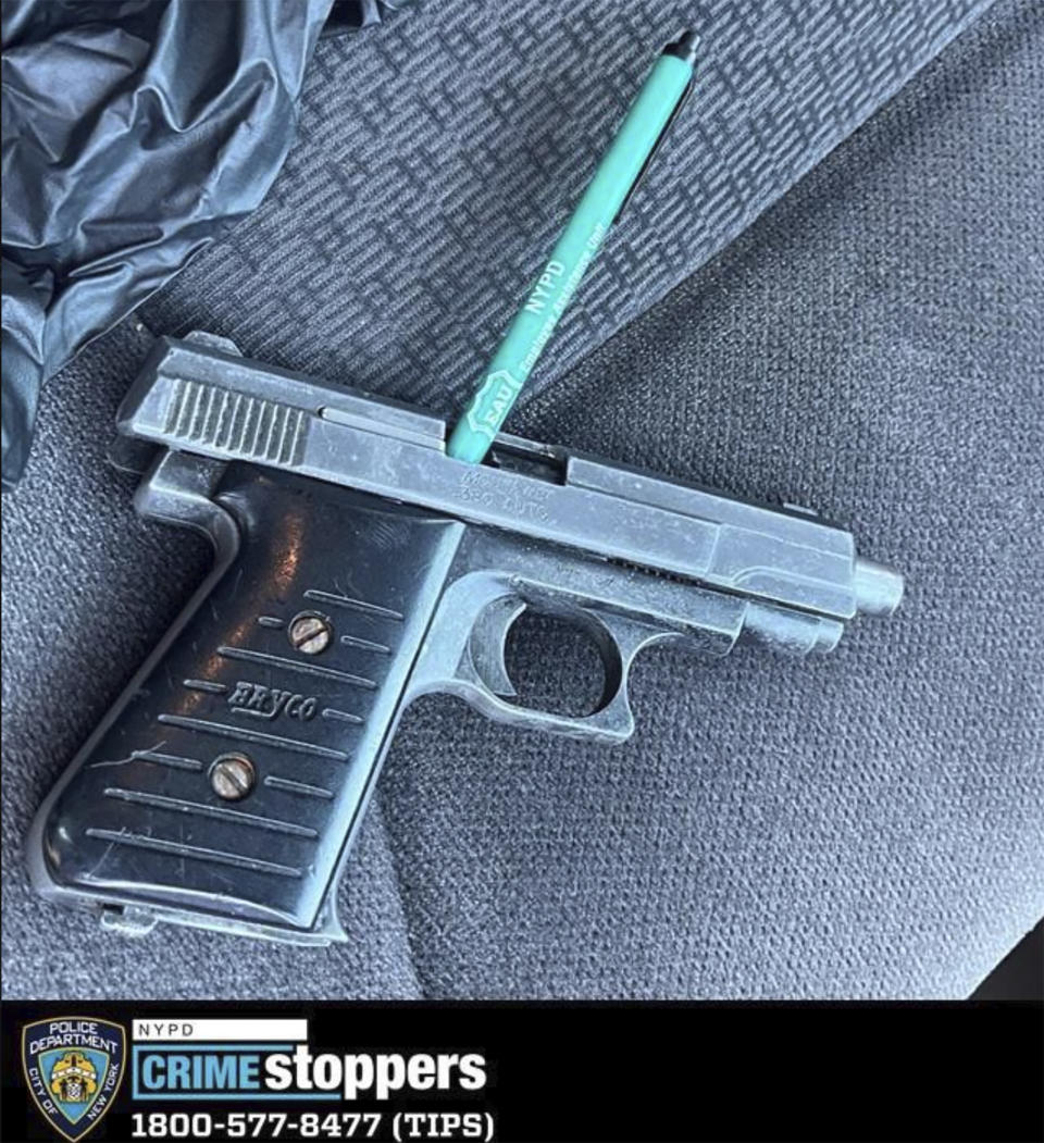 This photo provided by the New York City Police Department shows a gun recovered at the scene of an officer-involved shooting on Monday, March 25, 2024, in New York. A New York City police officer was shot and killed Monday during a traffic stop in the Far Rockaway section of Queens, the city's mayor said. The officer and his partner were part of the NYPD Critical Response Team. (New York City Police Department via AP)