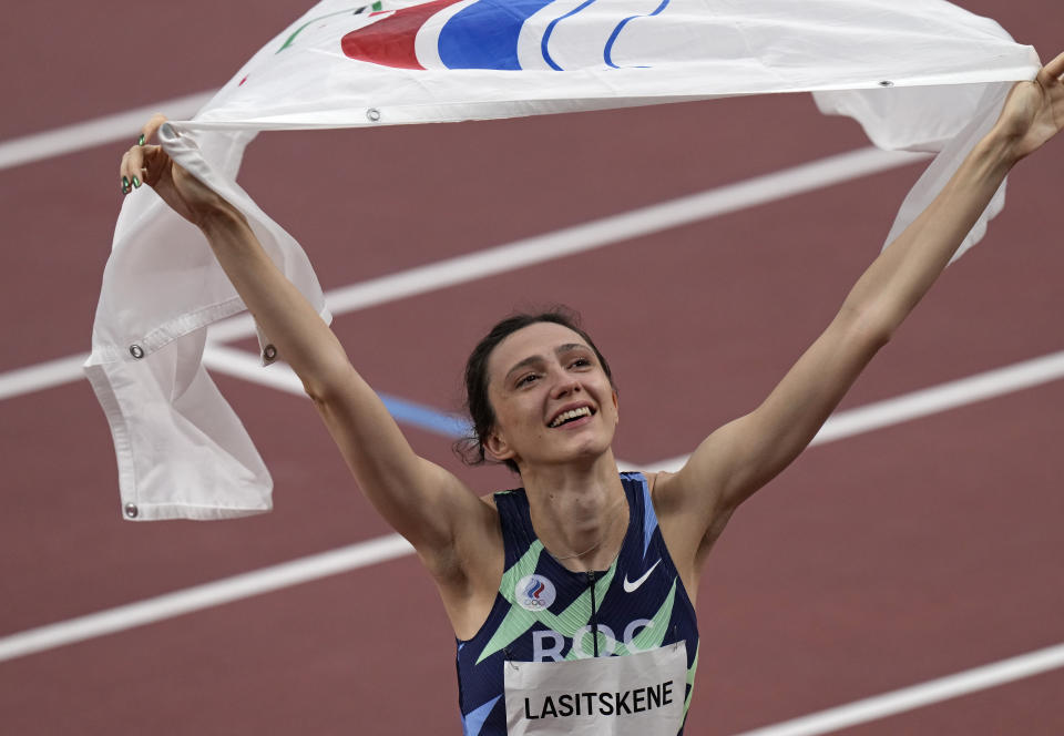 Mariya Lasitskene, of Russian Olympic Committee, reacts after winning the women's high jump final at the 2020 Summer Olympics, Saturday, Aug. 7, 2021, in Tokyo. (AP Photo/Francisco Seco)