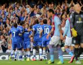 Chelsea's Eden Hazard (17) celebrates with teammates after Aston Villa's Antonio Luna (right) scores a own goal