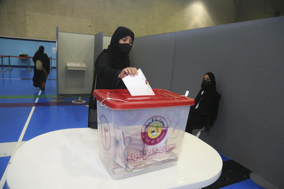 Qataris vote in legislative elections in Doha, Qatar, Saturday, Oct. 2, 2021. For the first time citizens will elect two-thirds of Shura council while emir will appoint the remaining 15 members. (AP Photo/Hussein Sayed)