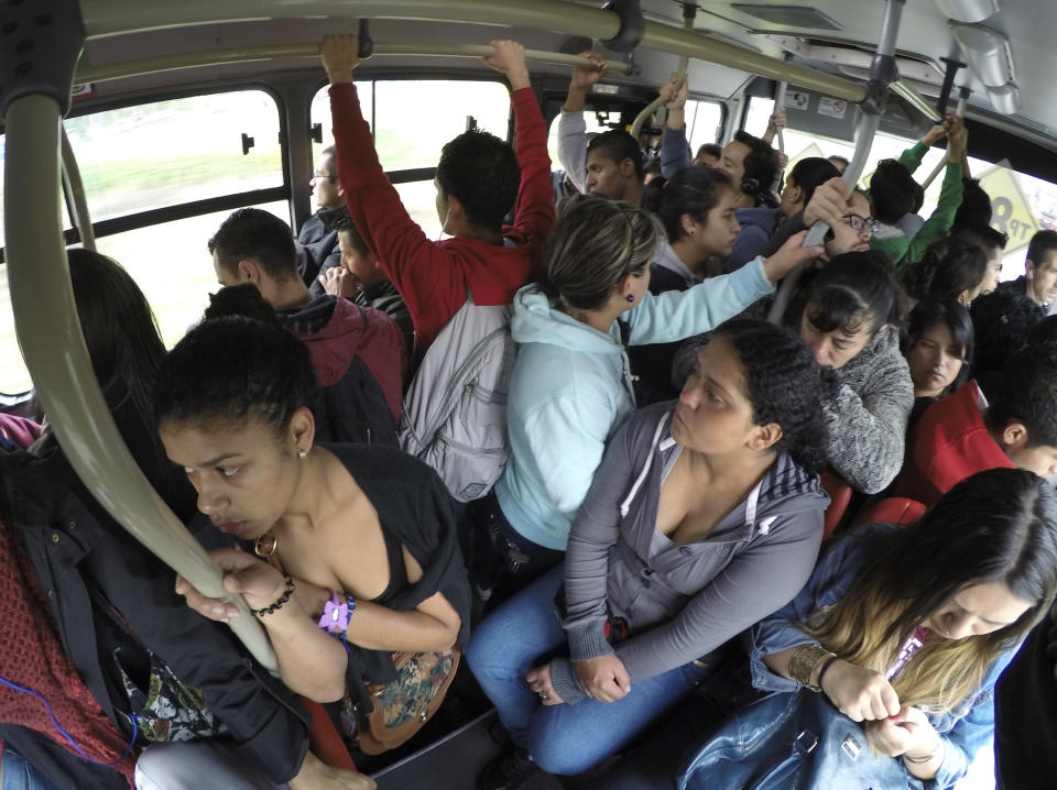 Passengers are seen on the Transmilenio system bus during rush hour in Bogota, Colombia. (Photo: John Vizcaino / Reuters)