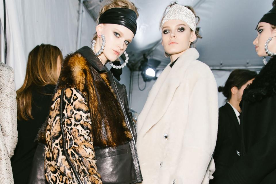 From bold color statements to '80s hair accessories, eight standout beauty moments from New York Fashion Week Fall 2018.