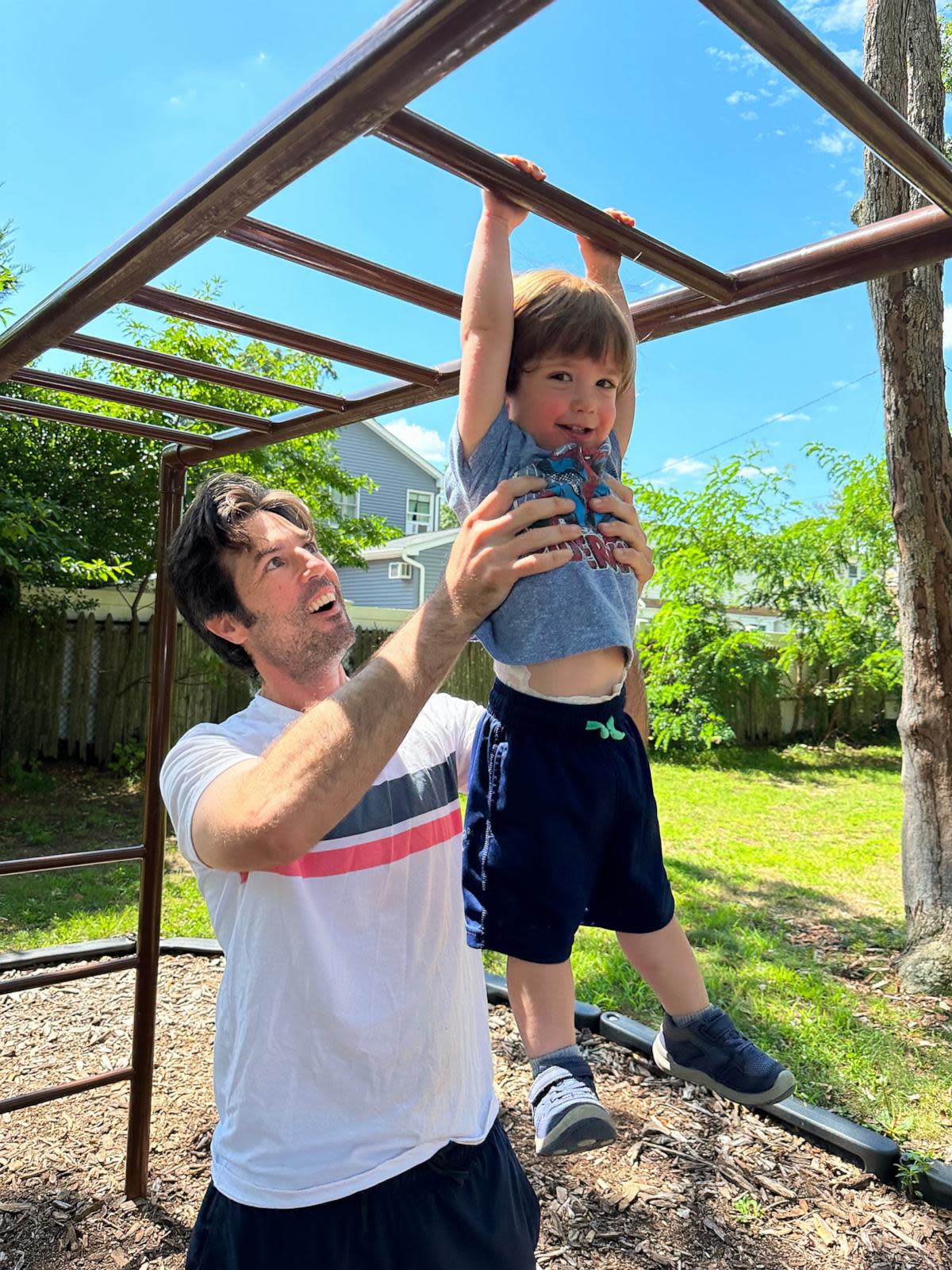 PHOTO: Dominic McNulty lifts up his son, Dominic Jr. (Karen McNulty)