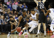 Butler guard Kamar Baldwin (3) drives as Seton Hall guard Shavar Reynolds (33) defends next to Butler's Sean McDermott during the second half of an NCAA college basketball game Wednesday, Feb. 19, 2020, in Newark, N.J. Seton Hall won 74-72. (AP Photo/Kathy Willens)