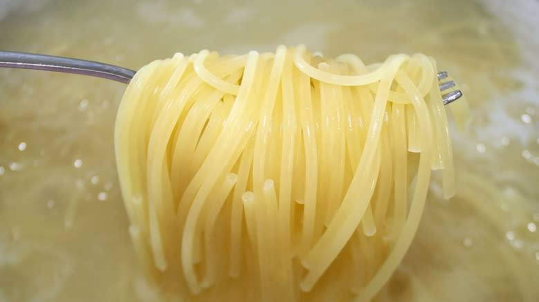 cooked pasta on fork