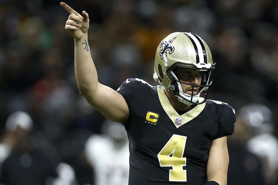 NEW ORLEANS, LOUISIANA – JANUARY 07: Derek Carr #4 of the New Orleans Saints celebrates after a touchdown in the first half at Caesars Superdome on January 07, 2024 in New Orleans, Louisiana. (Photo by Chris Graythen/Getty Images)