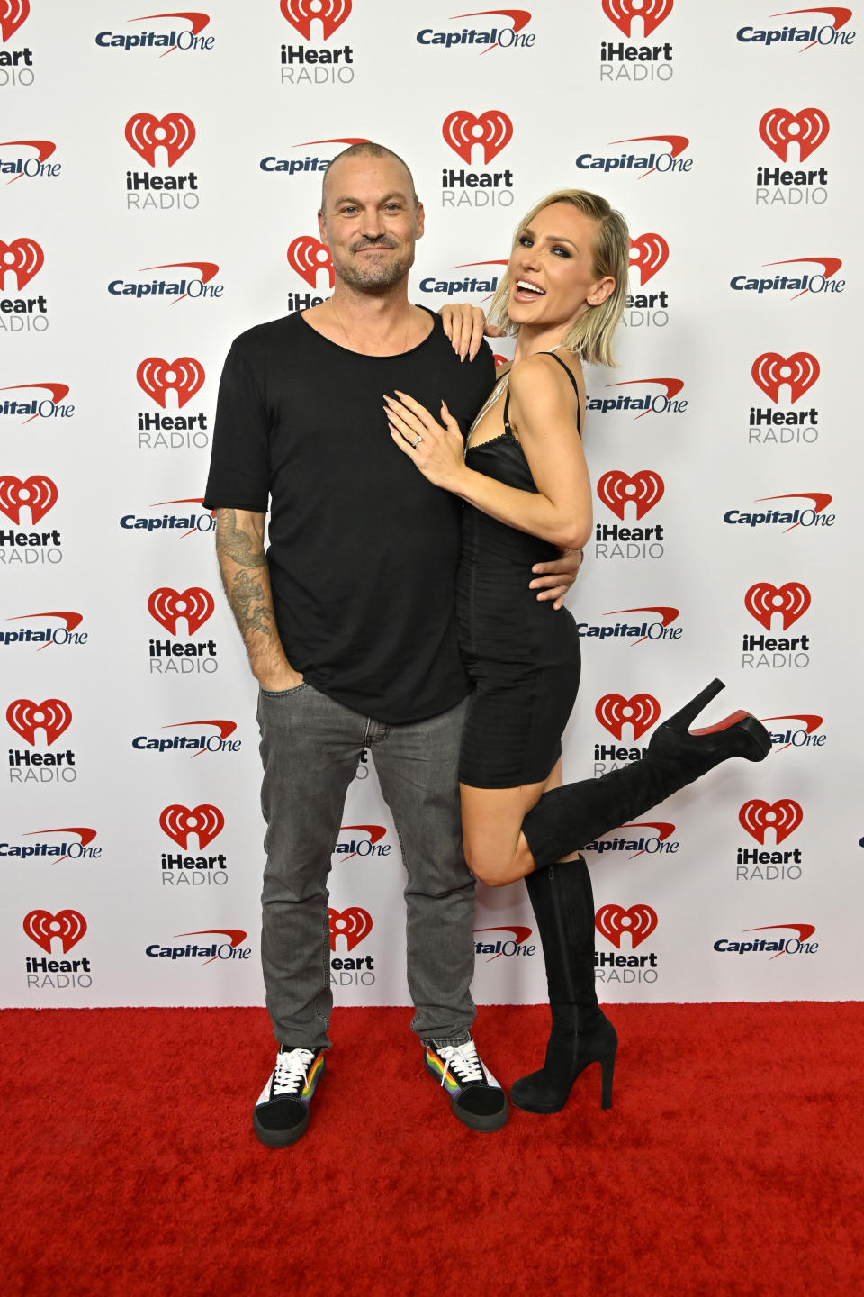 LAS VEGAS, NEVADA - SEPTEMBER 22: (FOR EDITORIAL USE ONLY) (L-R) Brian Austin Green and Sharna Burgess attend the 2023 iHeartRadio Music Festival at T-Mobile Arena on September 22, 2023 in Las Vegas, Nevada. (Photo by David Becker/Getty Images for iHeartRadio)