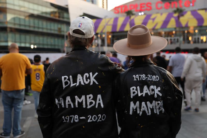 Mourners gather outside Staples Center before a Los Angeles Lakers home game to pay respects to Kobe Bryant