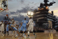 CORONADO, CA - NOVEMBER 11: Keith Appling #11 of the Michigan State Spartans drives to the basket against the North Carolina Tar Heels during the Quicken Loans Carrier Classic on board the USS Carl Vinson on November 11, 2011 in Coronado, California. (Photo by Ezra Shaw/Getty Images)