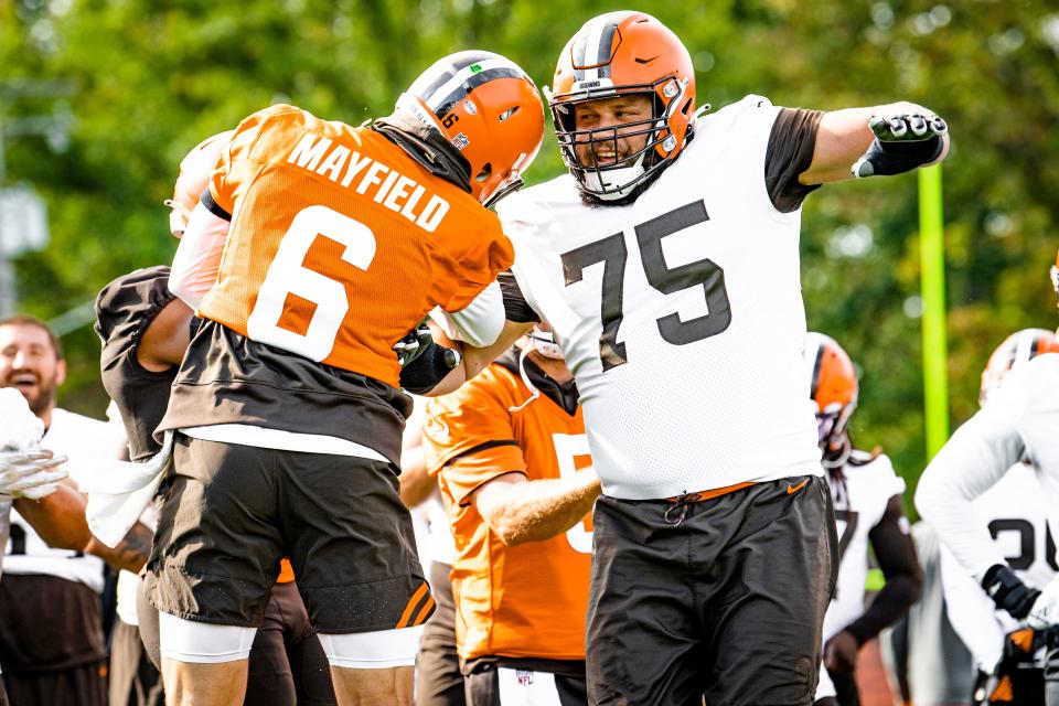 Quarterback Baker Mayfield (6) and offensive guard Joel Bitonio (75) during practice on October 8, 2021. Bitonio will make his 100th career start Sunday against the Los Angeles Chargers at SoFi Stadium.