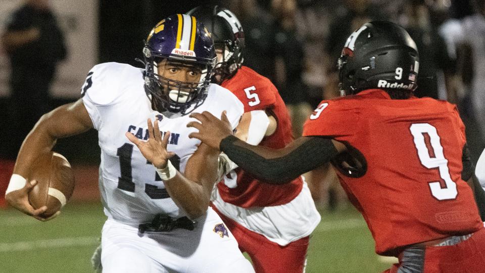 Camden's Deante Ruffin runs the ball during the football game between Camden and Haddonfield played at Haddonfield Memorial High School on Friday, October 7, 2022.  